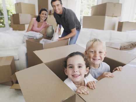 House removals planning in Hillingdon with moving boxes and van
