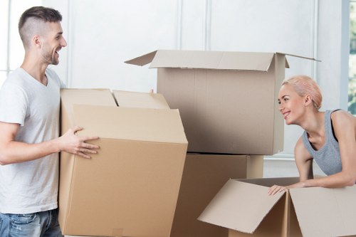Professional removals team handling furniture during a Hillingdon move